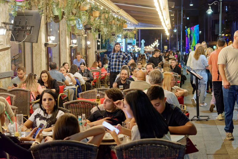 3 - A busy outdoor cafe terrace in the historic Old Town district of Bucharest